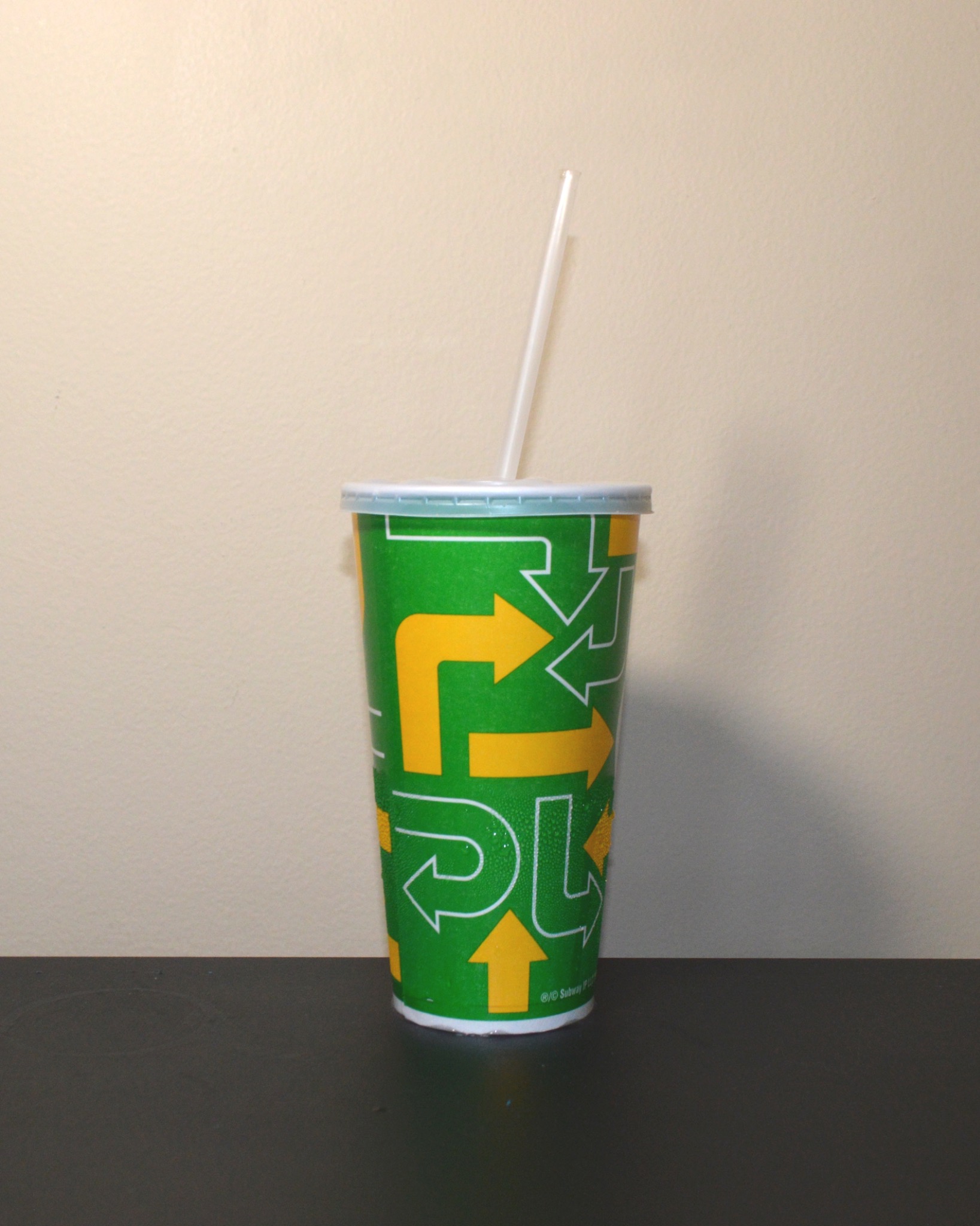 Green cup on a table